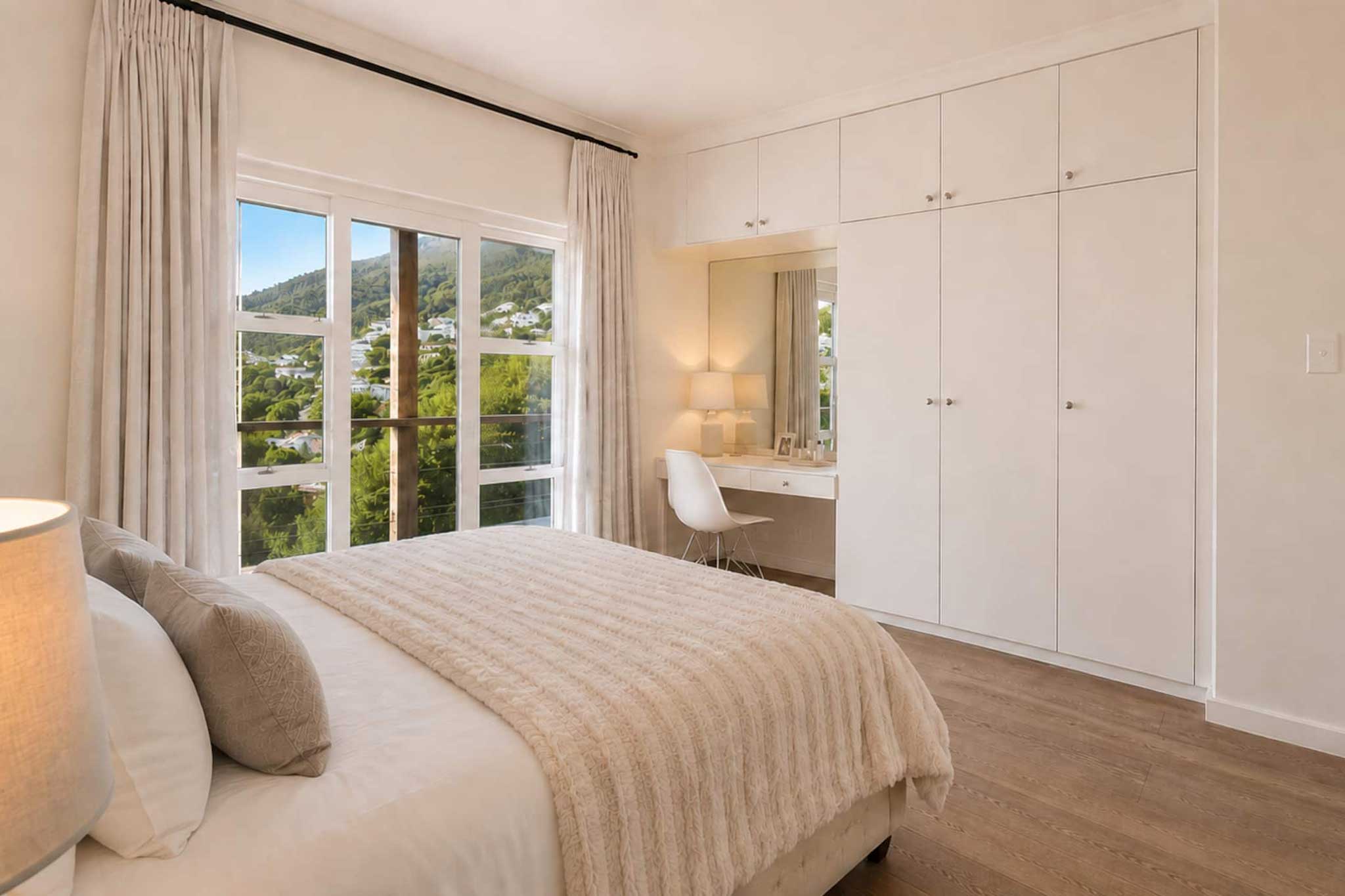 Spacious bedroom with garden views